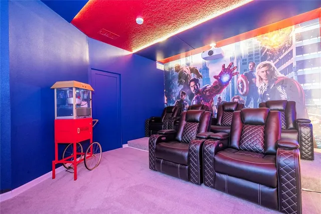 a palm tree sitting in front of a building with palm trees