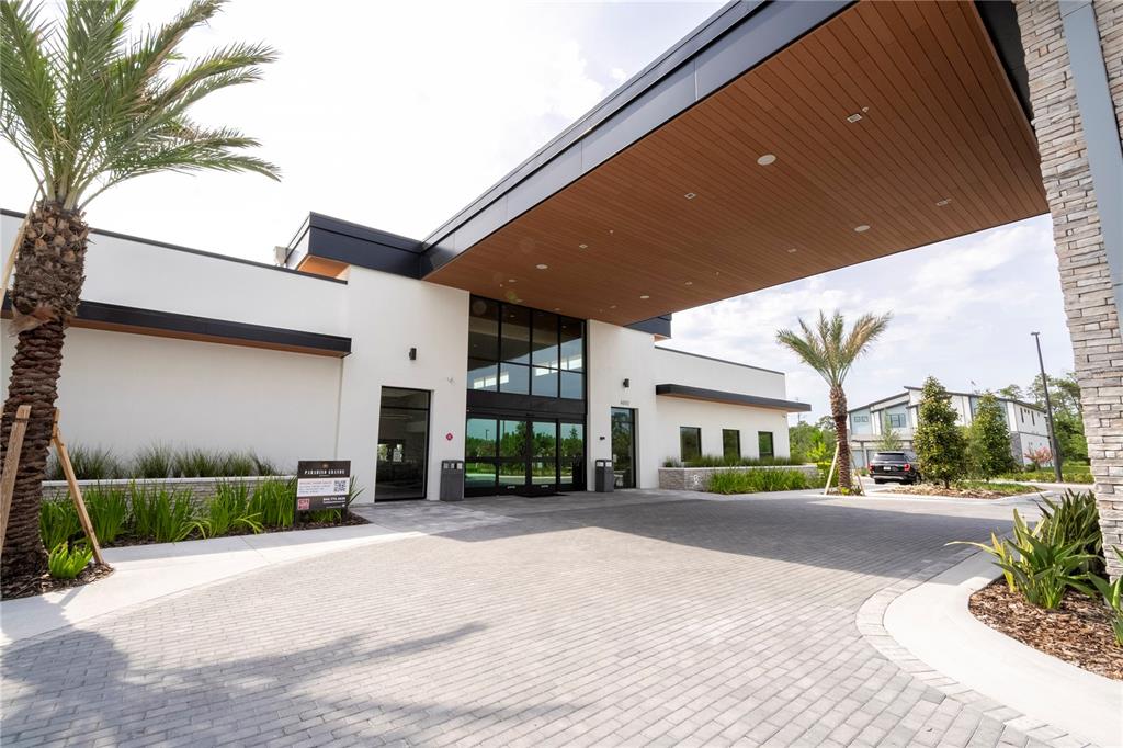 5887 High Seas Drive Orlando, FL 32821 - Photo 86 of 93 a view of a street with a building