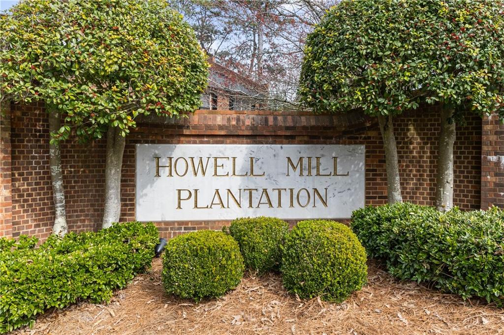 26 Howell Mill Road Northwest Atlanta, GA 30327 - Photo 31 of 33 a sign on the side of a road