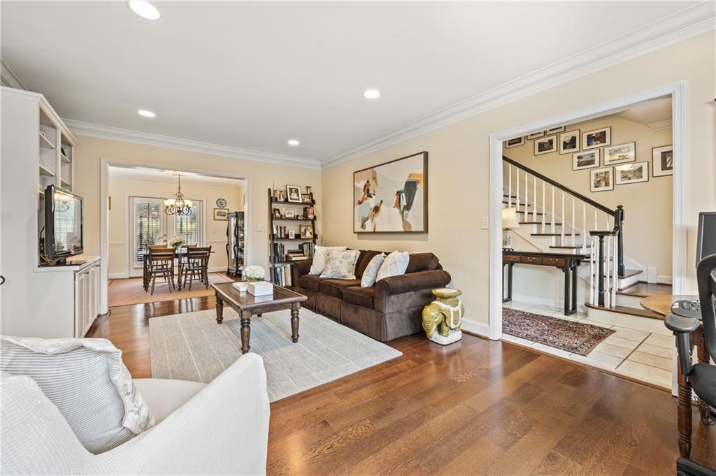 26 Howell Mill Road Northwest Atlanta, GA 30327 - Photo 5 of 33 a living room with furniture and a fireplace
