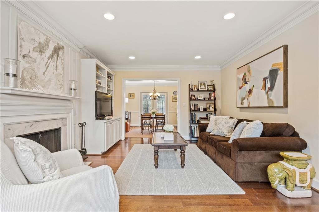 26 Howell Mill Road Northwest Atlanta, GA 30327 - Photo 6 of 33 a living room with furniture and a fireplace