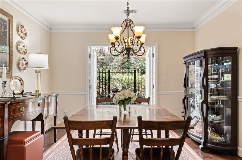 26 Howell Mill Road Northwest Atlanta, GA 30327 - Photo 9 of 33 a view of a dining room with furniture window and outside view