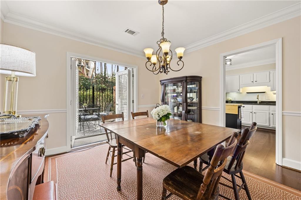 26 Howell Mill Road Northwest Atlanta, GA 30327 - Photo 10 of 33 a view of a dining room and a table or chairs