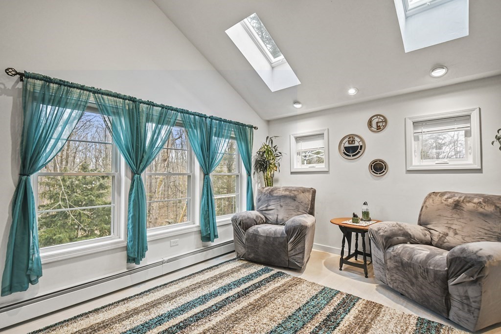 36 Inwood Road Auburn, MA 01501 - Photo 13 of 39 a living room with furniture and a large window