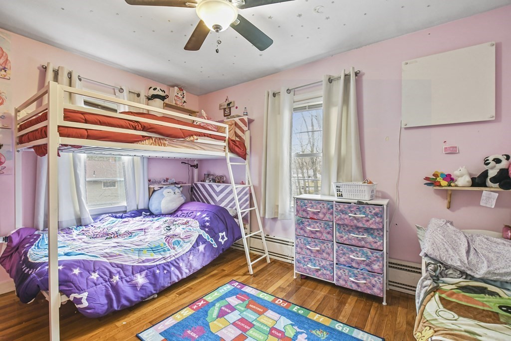 36 Inwood Road Auburn, MA 01501 - Photo 21 of 39 a bedroom with a bed and a dresser