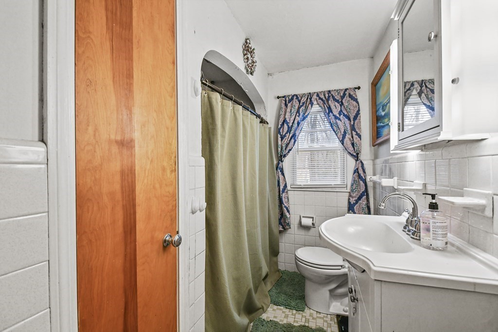 36 Inwood Road Auburn, MA 01501 - Photo 23 of 39 a bathroom with a sink a toilet and shower