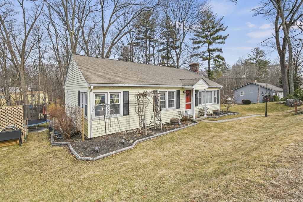 36 Inwood Road Auburn, MA 01501 - Photo 29 of 39 a view of house with yard and sitting area