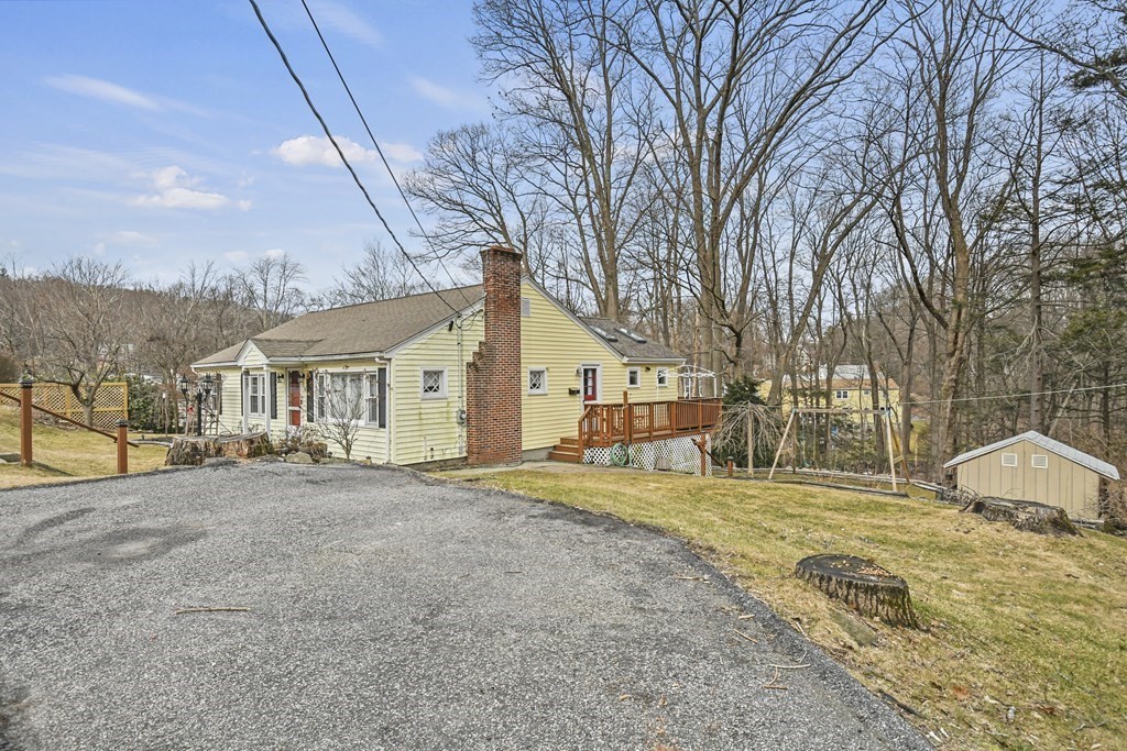 36 Inwood Road Auburn, MA 01501 - Photo 30 of 39 a house with trees in front of it