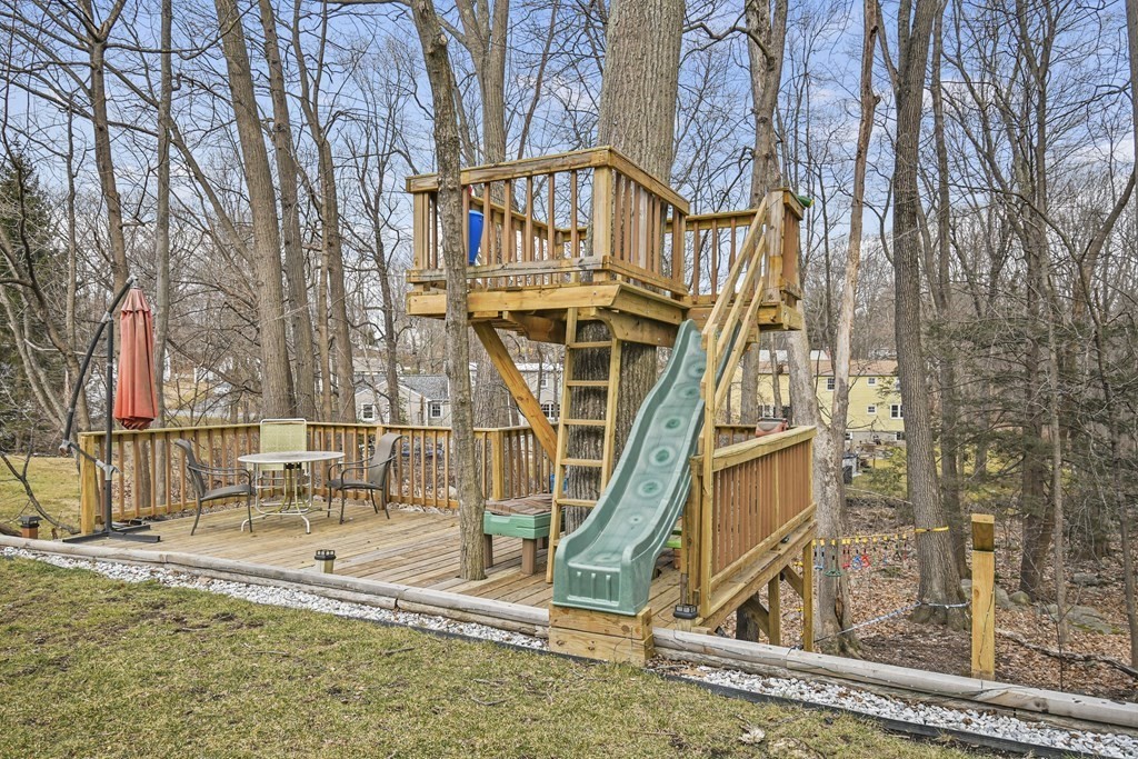 36 Inwood Road Auburn, MA 01501 - Photo 38 of 39 a view of a house with a small yard and large tree