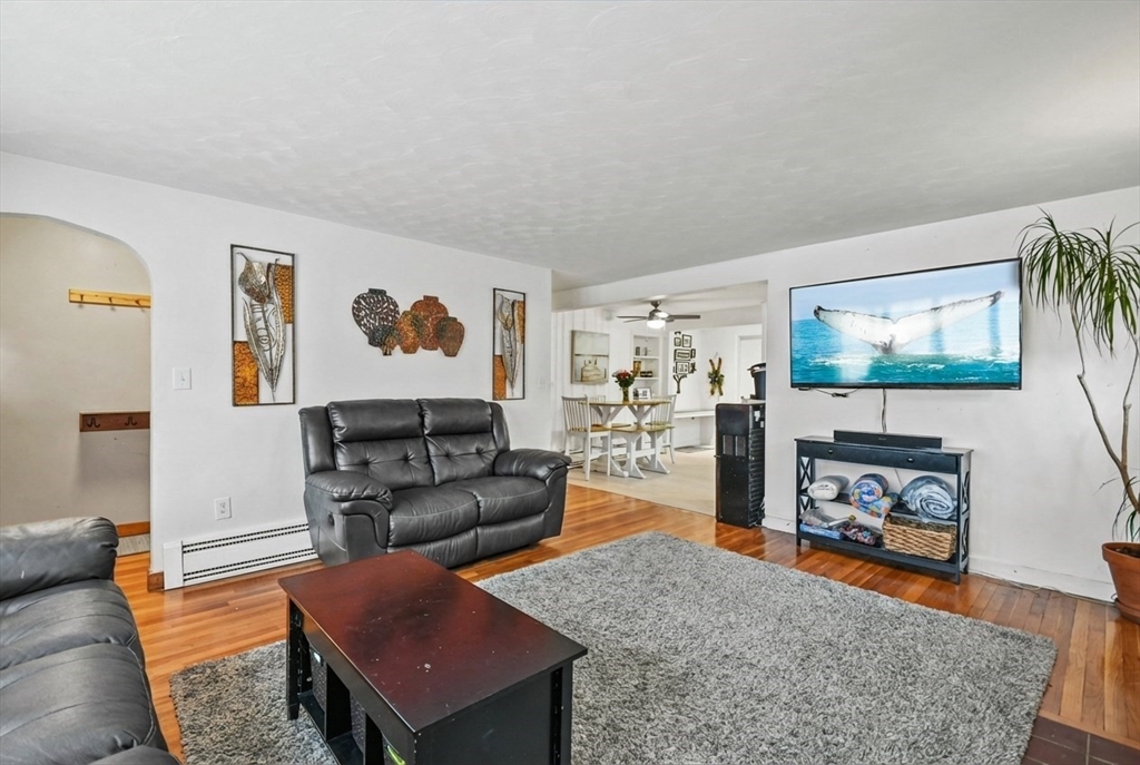 36 Inwood Road Auburn, MA 01501 - Photo 4 of 39 a living room with furniture and a flat screen tv
