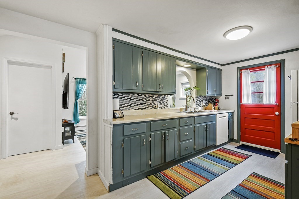 36 Inwood Road Auburn, MA 01501 - Photo 10 of 39 a bathroom with a sink and a mirror