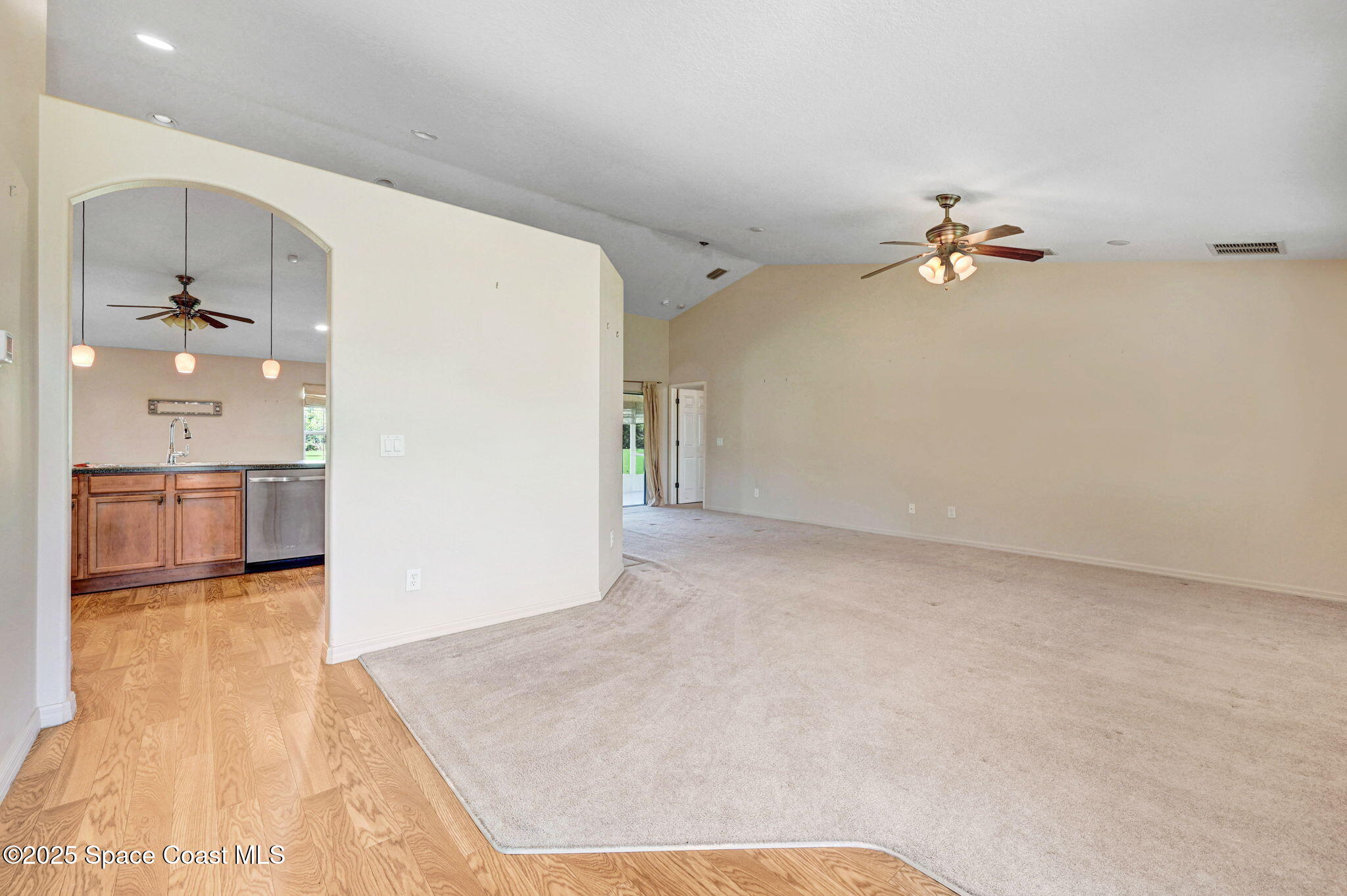 1207 Van Tassel Trail Palm Bay, FL 32905 - Photo 7 of 28 a view of a livingroom with a kitchen