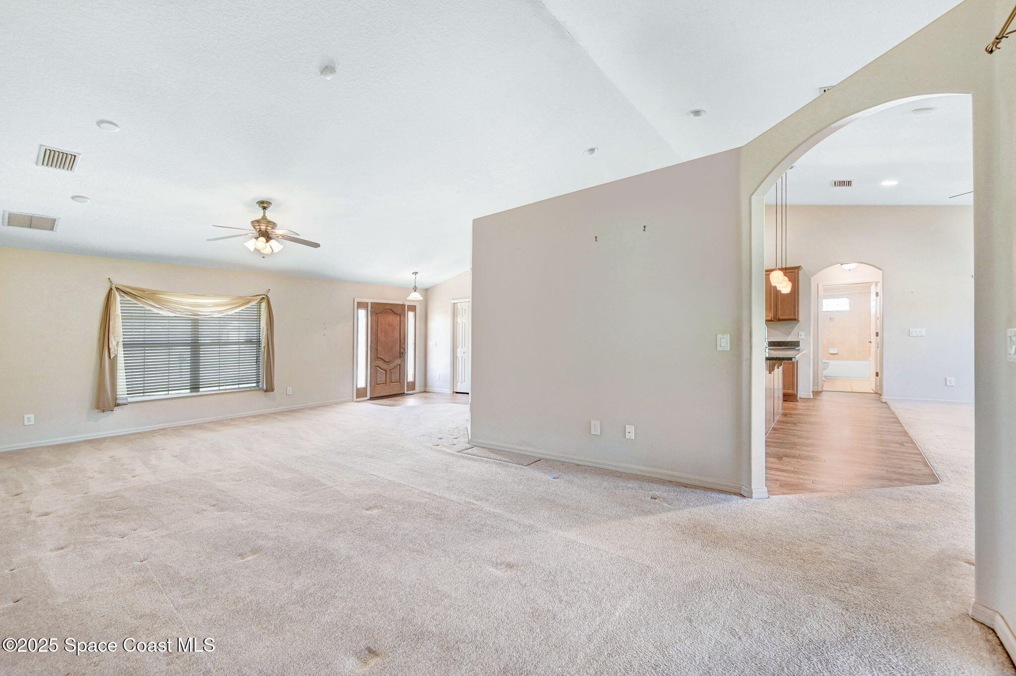 1207 Van Tassel Trail Palm Bay, FL 32905 - Photo 10 of 28 a view of a big room with closet and windows
