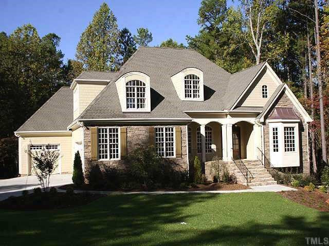 2416 Loring Court Raleigh, NC 27613 - Photo 1 of 10 Great transitional new home on .9 ac. lot. Room for a pool. Huge unfinished basement with unlimited possibilities! Exterior Front
