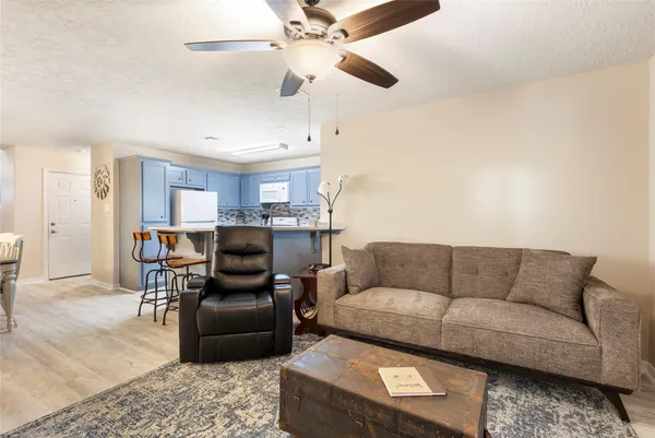 a living room with furniture and a couch