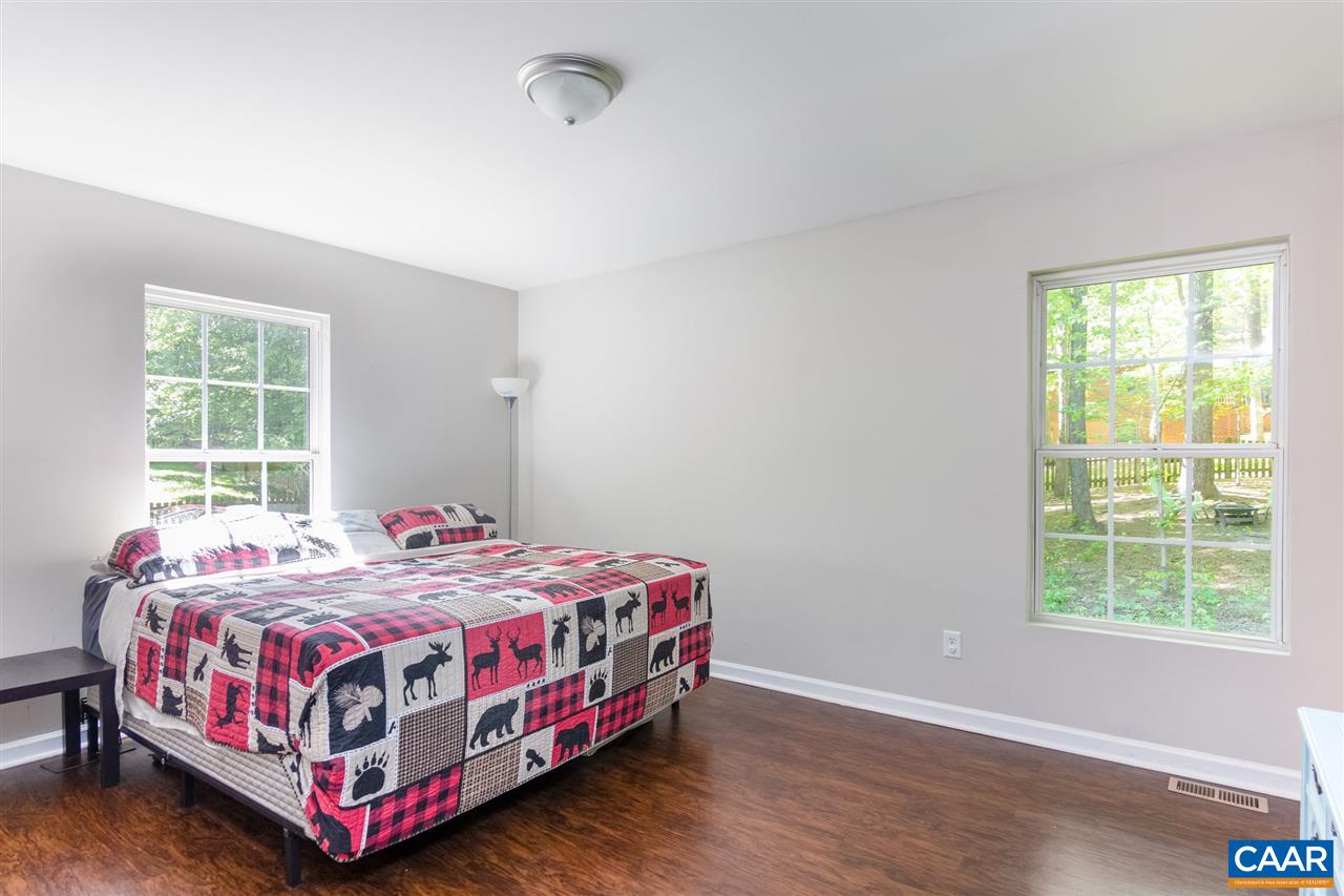 18 East Point Road Palmyra, VA 22963 - Photo 12 of 20 a bedroom with a bed and a window
