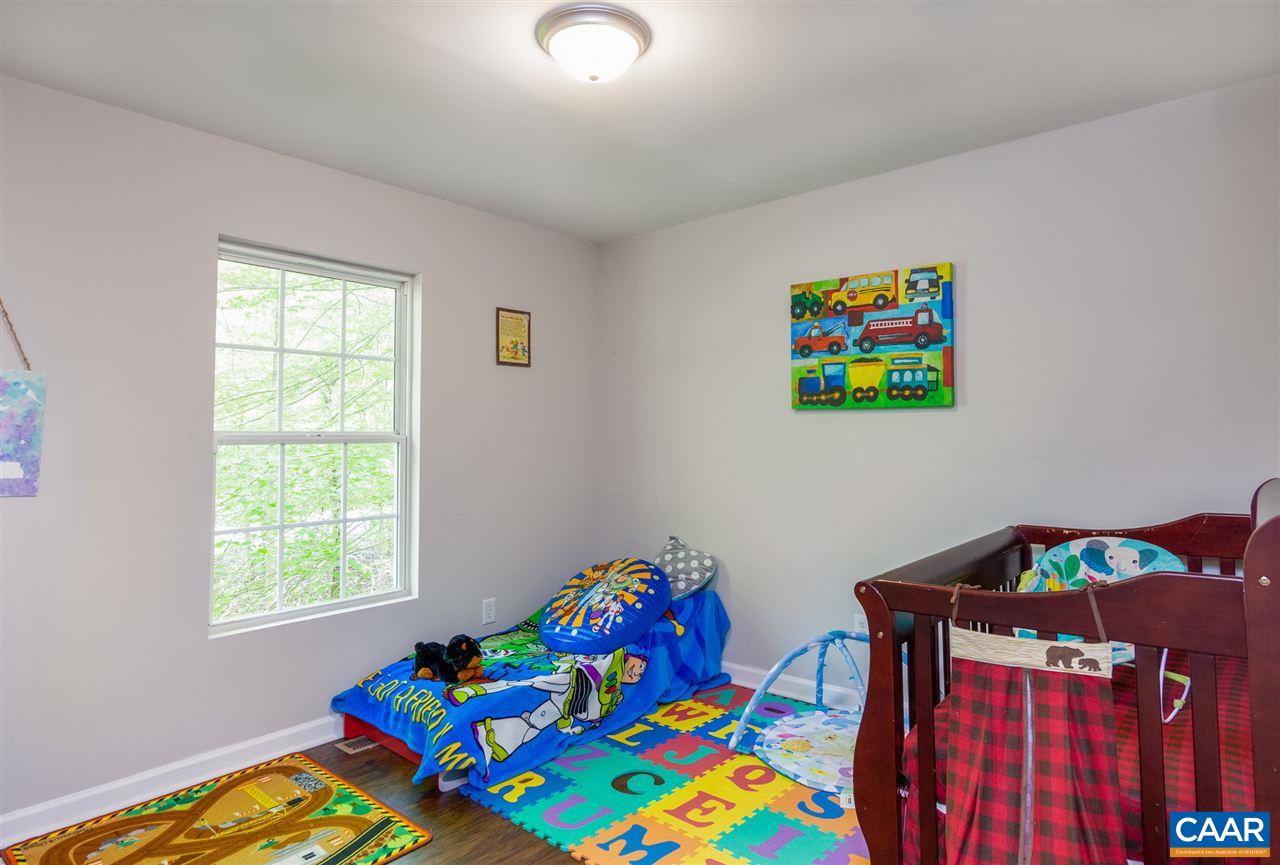 18 East Point Road Palmyra, VA 22963 - Photo 17 of 20 a bedroom with a bed and a window