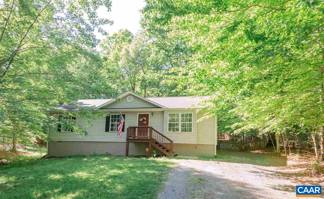 18 East Point Road Palmyra, VA 22963 - Photo 2 of 20 a front view of a house with a yard and trees