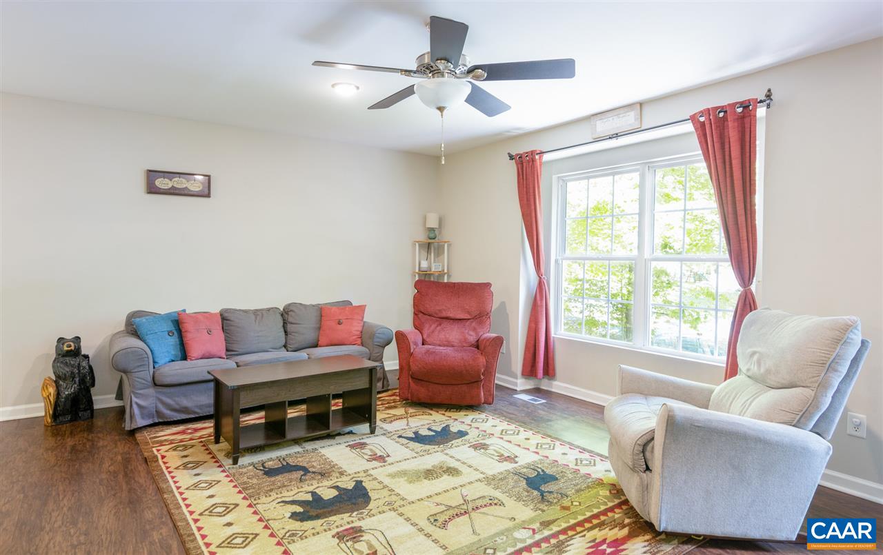 18 East Point Road Palmyra, VA 22963 - Photo 4 of 20 a living room with furniture and a window