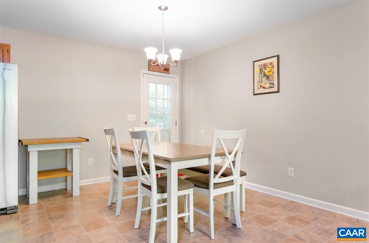 18 East Point Road Palmyra, VA 22963 - Photo 7 of 20 a view of a dining room with furniture and chandelier