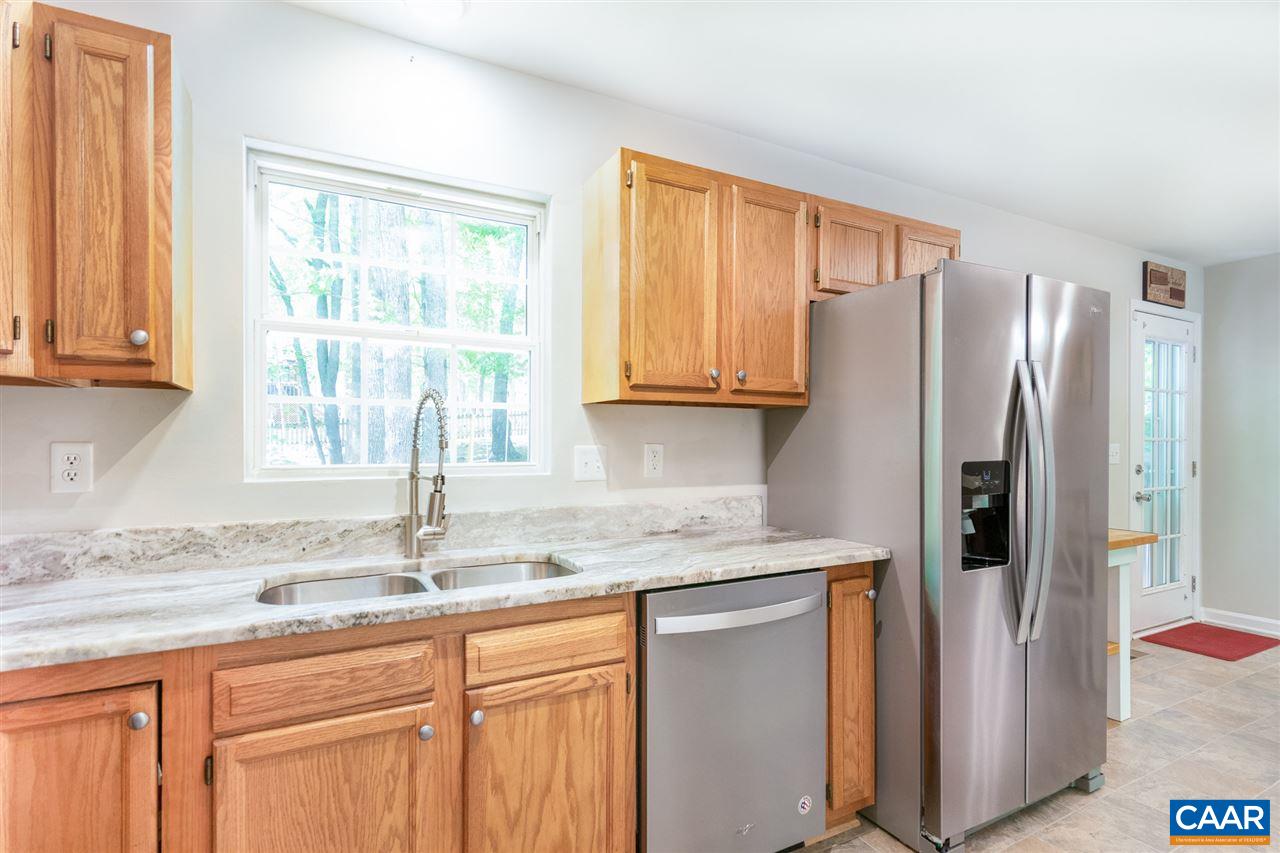 18 East Point Road Palmyra, VA 22963 - Photo 10 of 20 a kitchen with stainless steel appliances granite countertop a refrigerator and a sink