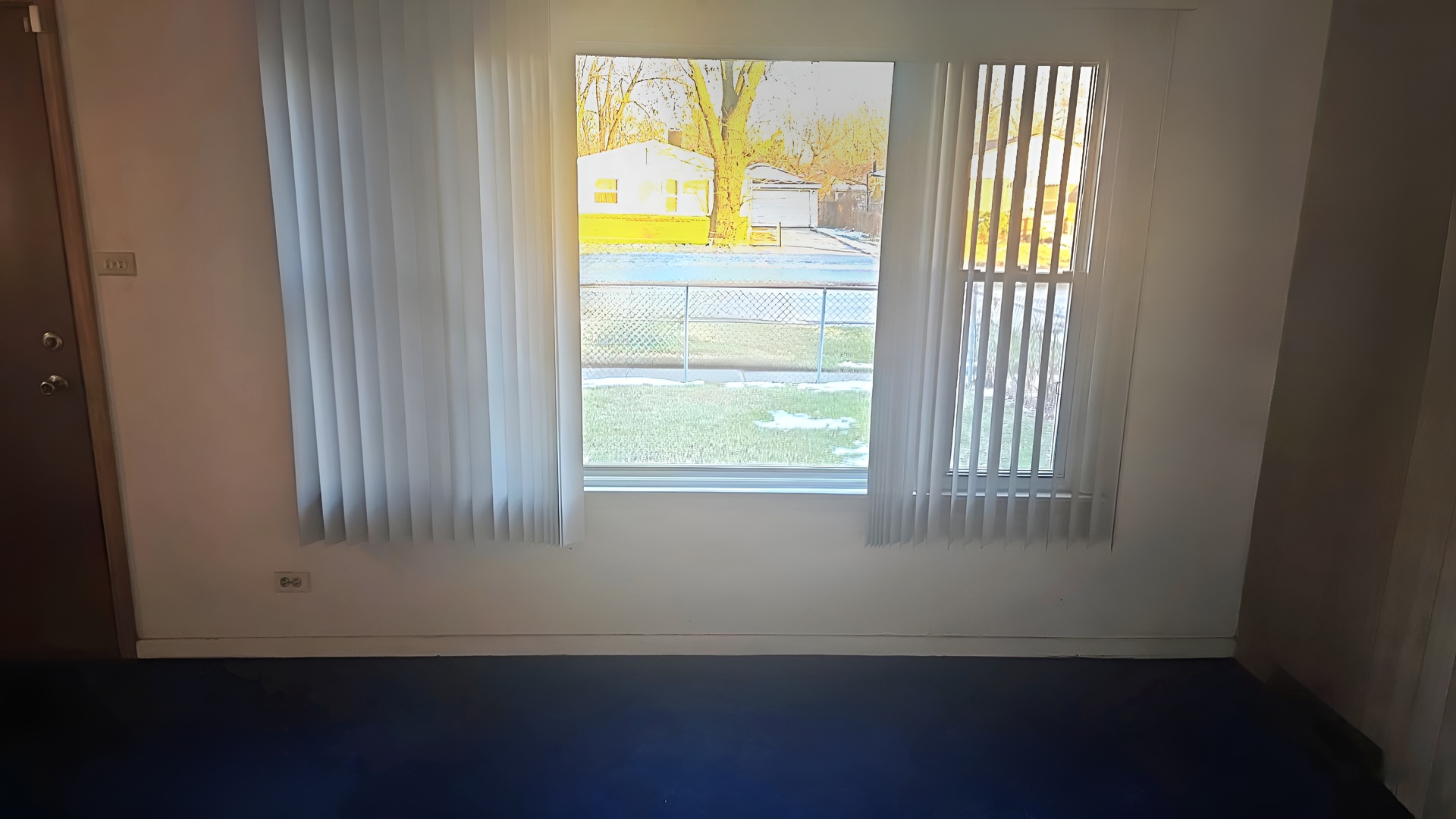 16628 Winchester Avenue Markham, IL 60428 - Photo 18 of 19 a view of an empty room with a window