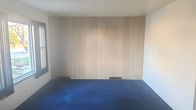 a view of a room with windows