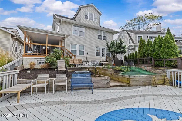 a view of house with patio outdoor seating