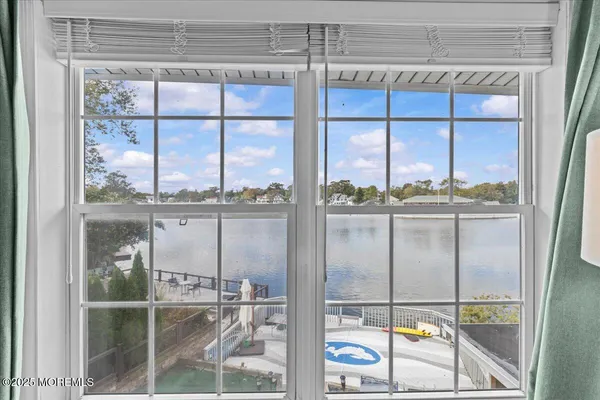 a kitchen with a glass window