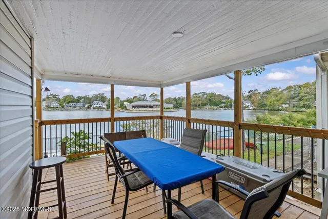 a view of a balcony with chairs