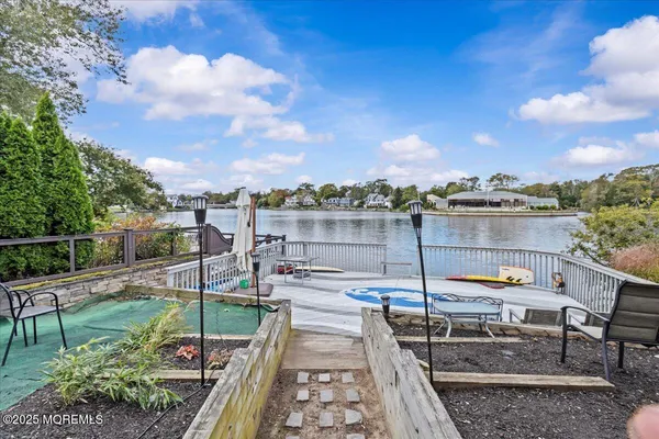 a view of a chairs and table on the terrace