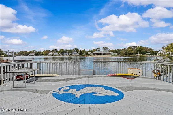 a view of swimming pool with a lounge chair