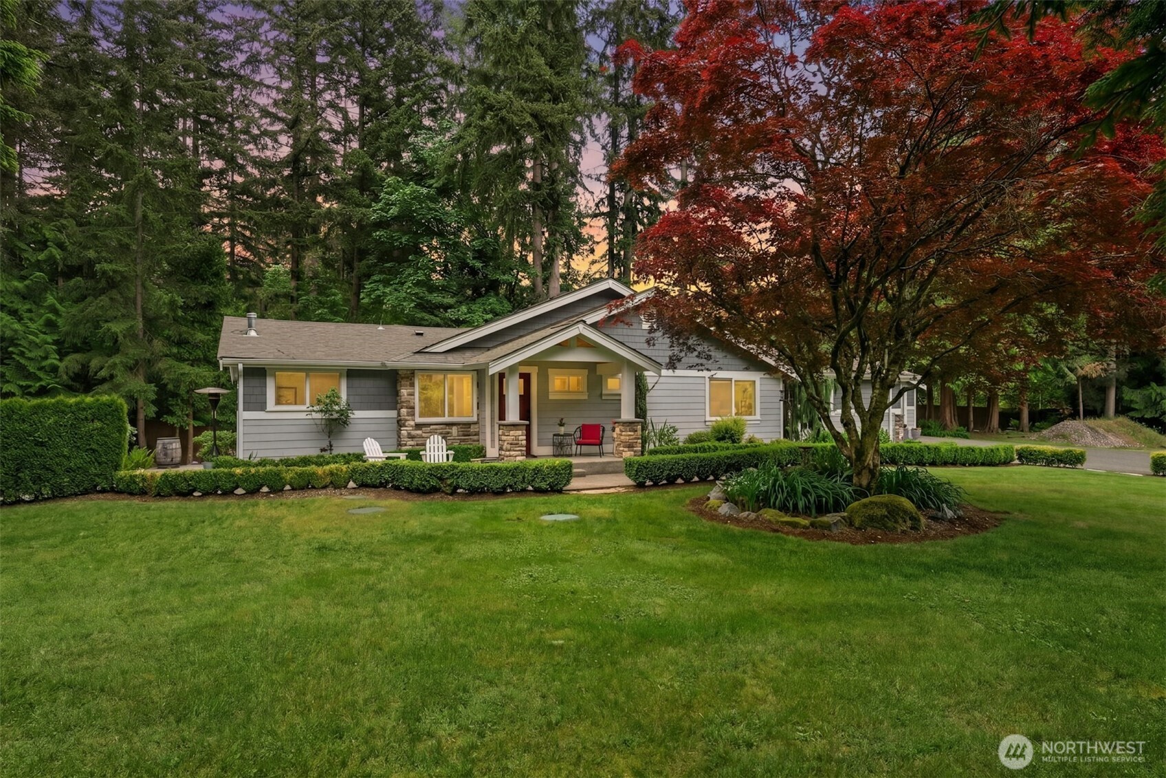 23307 49th Avenue Southeast Bothell, WA 98021 - Photo 32 of 37 a front view of a house with a yard and trees