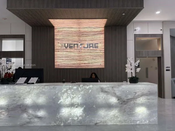 a view of a livingroom with a large window