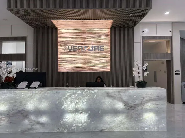 a view of a livingroom with a large window