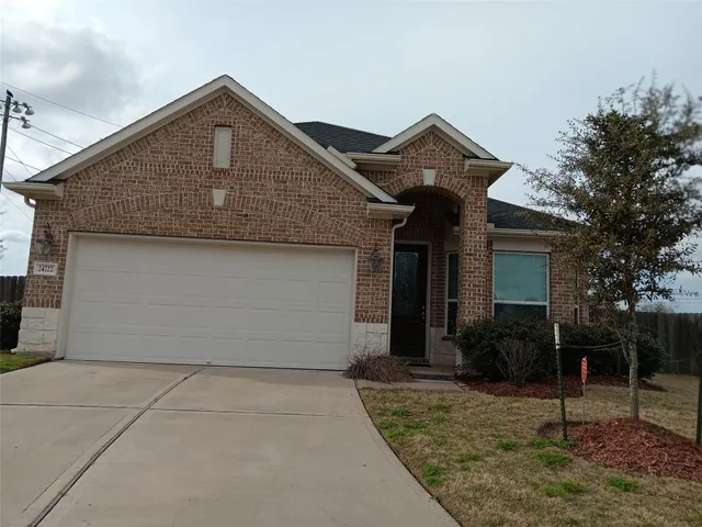 a view of house with backyard porch and seating