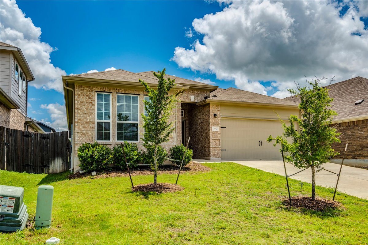 275 Cherrystone Loop Buda, TX 78610 - Photo 4 of 33 Welcome to 275 Cherrystone!