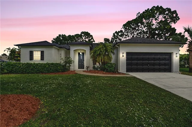 a house view with a garden space