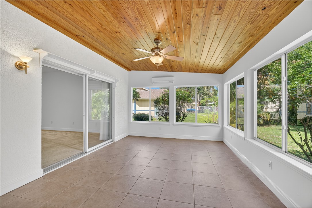 1712 Shakespeare Street Sebastian, FL 32958 - Photo 16 of 36 a view of an empty room with a window