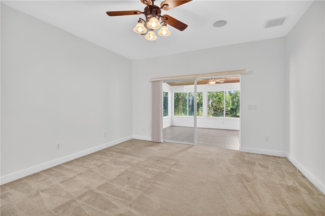 1712 Shakespeare Street Sebastian, FL 32958 - Photo 17 of 36 an empty room with a window