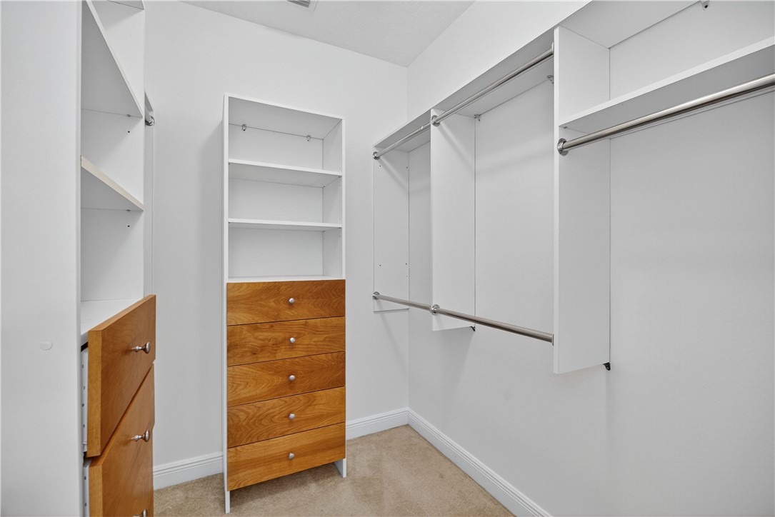 1712 Shakespeare Street Sebastian, FL 32958 - Photo 23 of 36 a view of walk in closet with empty racks