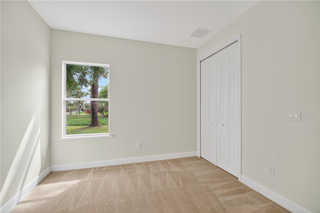 1712 Shakespeare Street Sebastian, FL 32958 - Photo 24 of 36 an empty room with windows