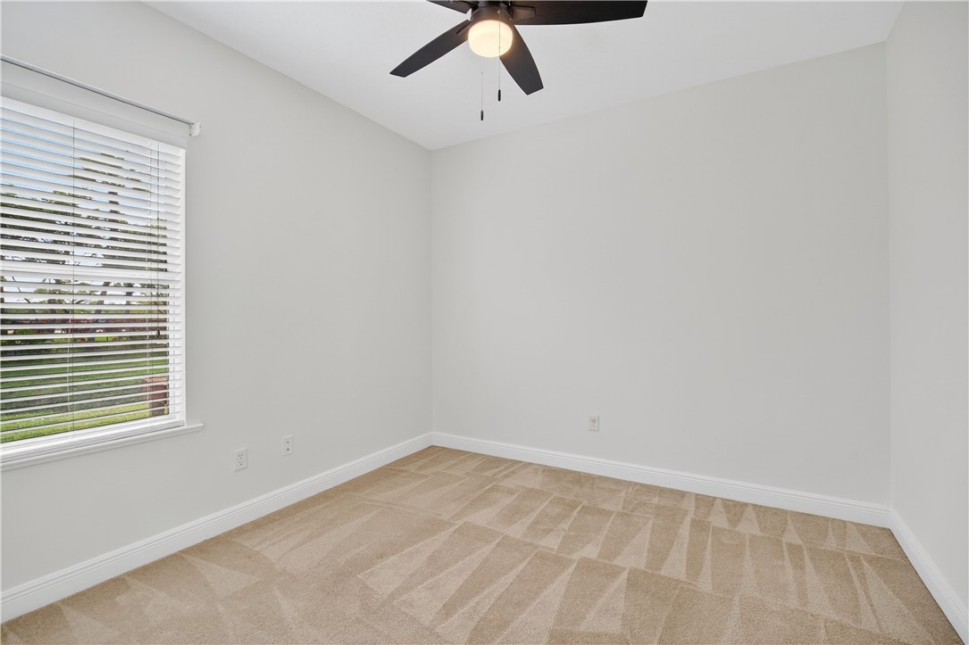 1712 Shakespeare Street Sebastian, FL 32958 - Photo 27 of 36 a view of an empty room with a window