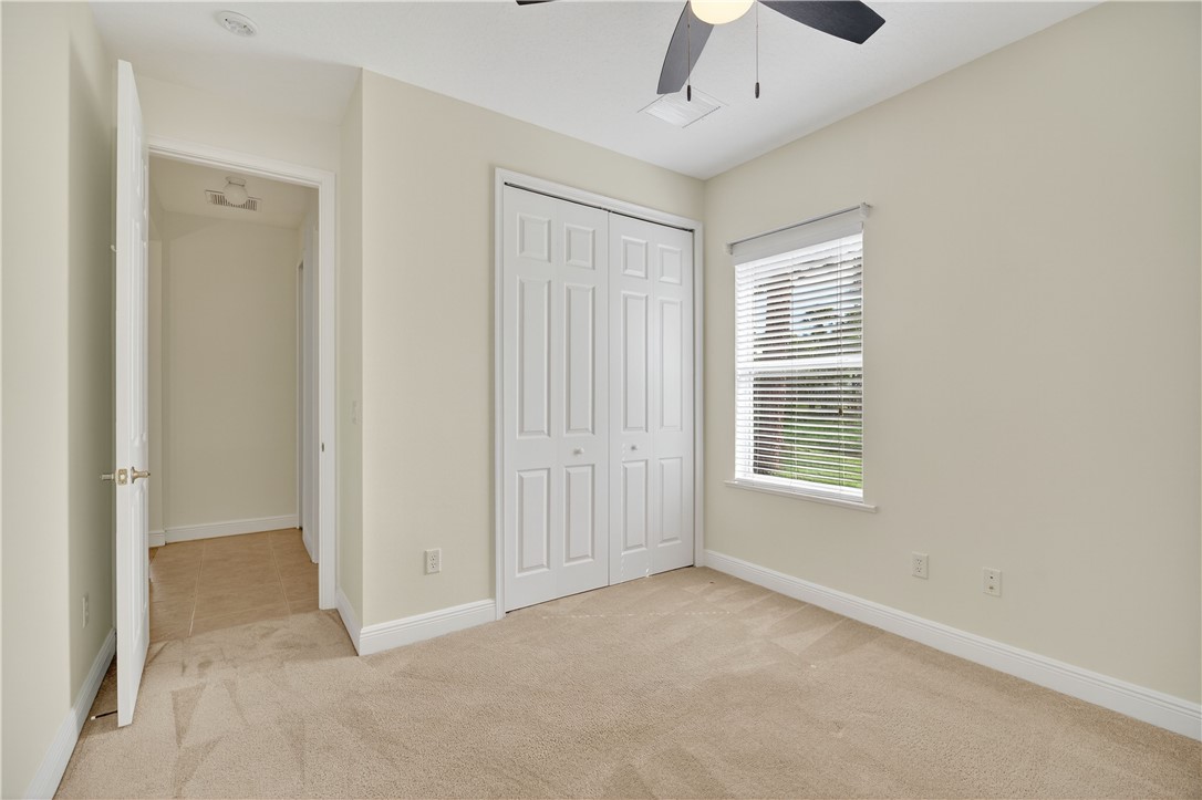 1712 Shakespeare Street Sebastian, FL 32958 - Photo 28 of 36 a view of an empty room with a window