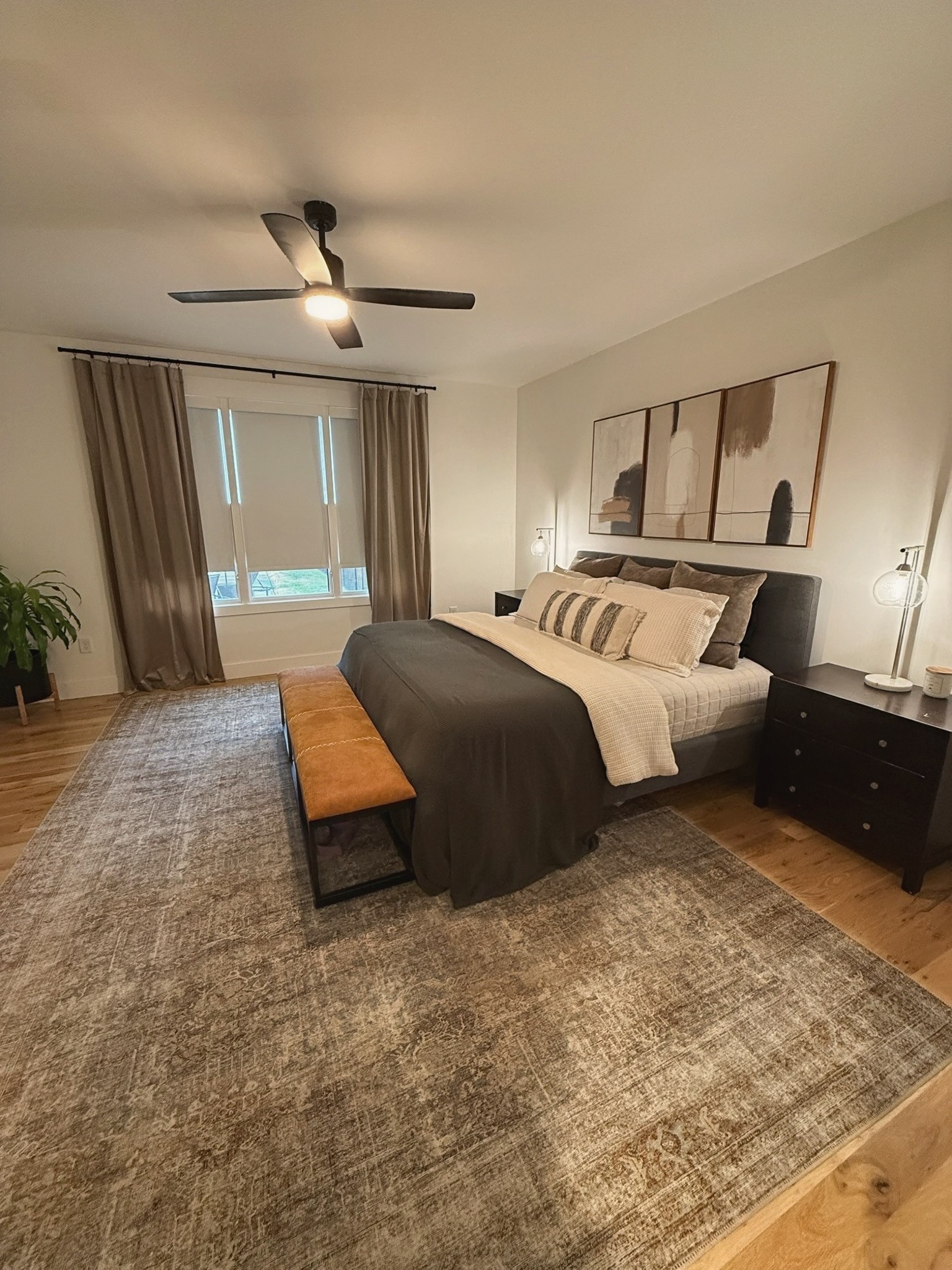 162 Vantrease Road Cottontown, TN 37048 - Photo 11 of 28 a spacious bedroom with a large bed and a dresser