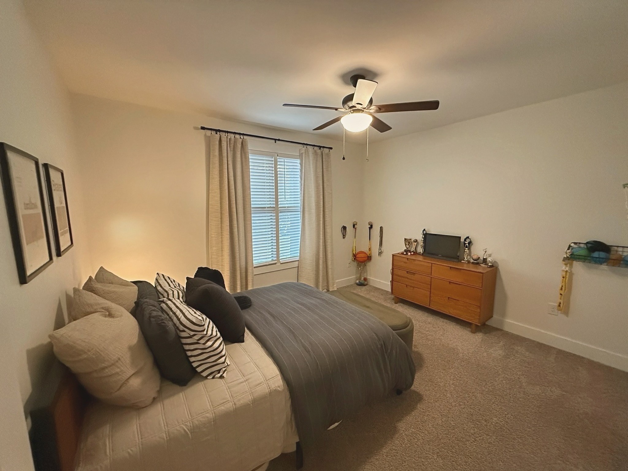 162 Vantrease Road Cottontown, TN 37048 - Photo 16 of 28 a bedroom with a bed and wooden floor