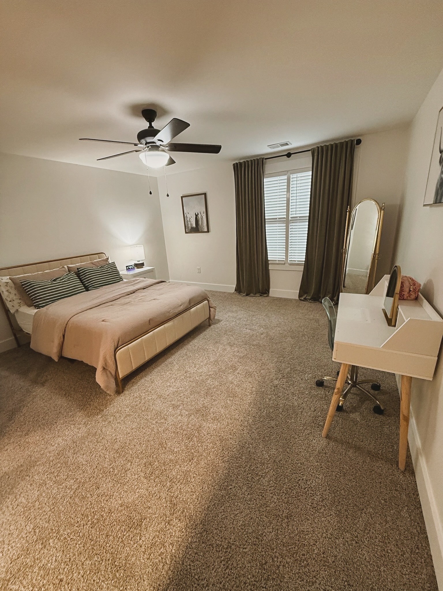 162 Vantrease Road Cottontown, TN 37048 - Photo 17 of 28 a spacious bedroom with a bed and chair