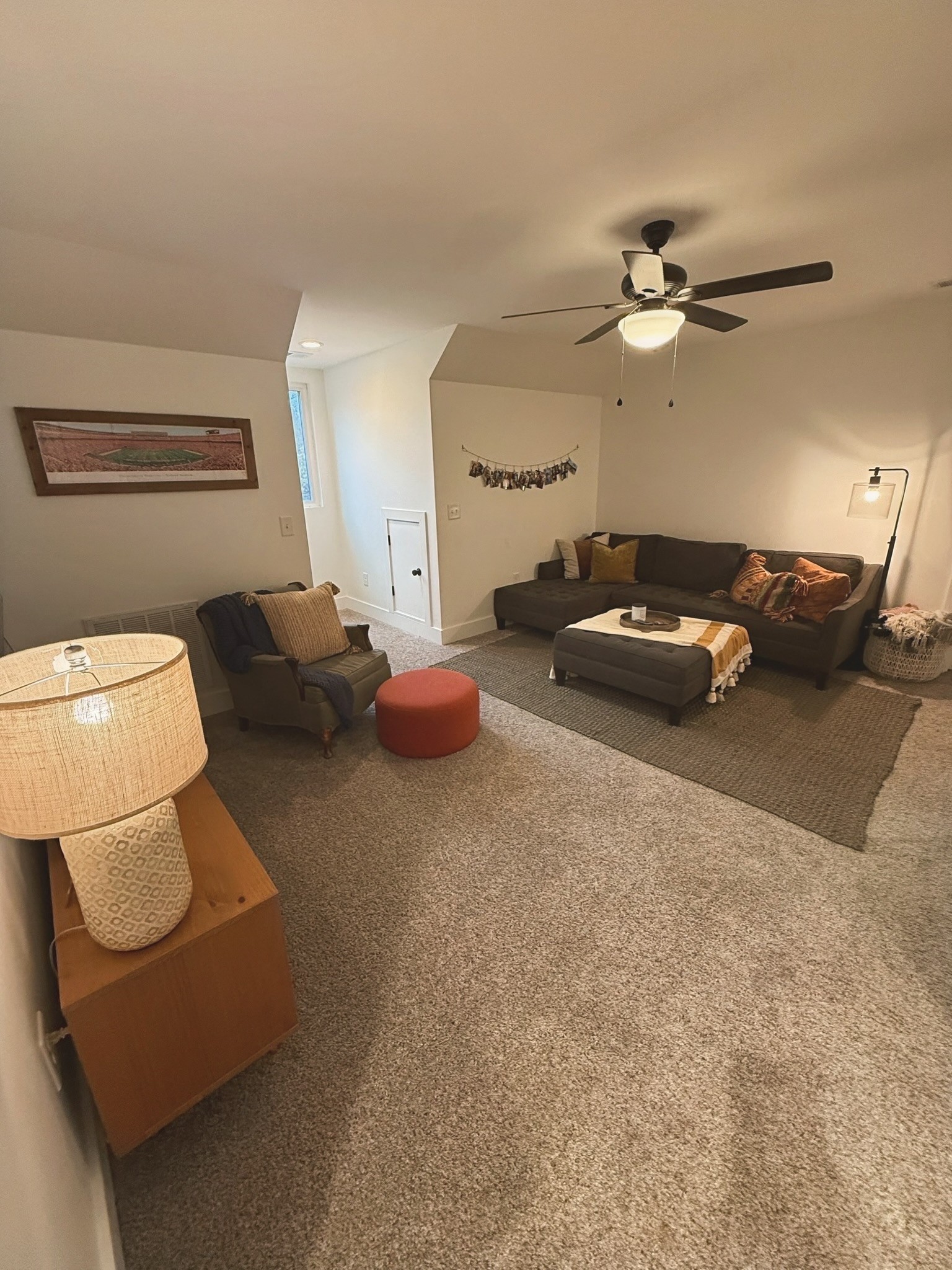 162 Vantrease Road Cottontown, TN 37048 - Photo 22 of 28 a living room with furniture and a chandelier