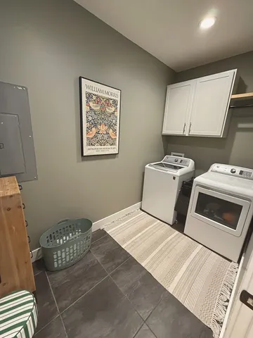 a bedroom with a bed and a chair