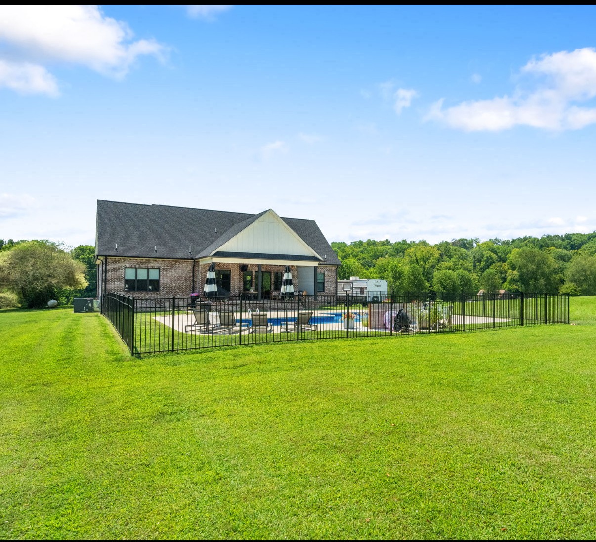 162 Vantrease Road Cottontown, TN 37048 - Photo 28 of 28 a view of a house with a big yard